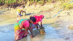 Traditional Hand Fishing by Village Women    Villa