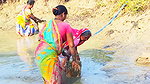 Traditional Hand Fishing by Village Women    Villa