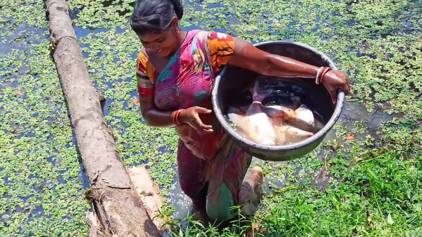 Traditional Hand Fishing by Village Women