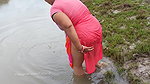x Village women mud crab catching in the shore of Ba