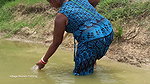 Village women net fishing in Village Pond   Lots o
