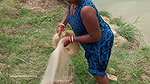Village women net fishing in Village Pond   Lots o