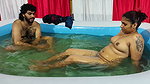 Couple bathing in pool