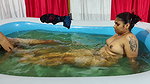 Couple bathing in pool