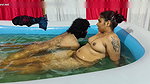 Couple bathing in pool