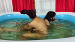 Couple bathing in pool
