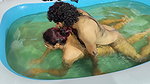 Couple hot romance in pool