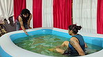 girl hot pool bath and boy watching