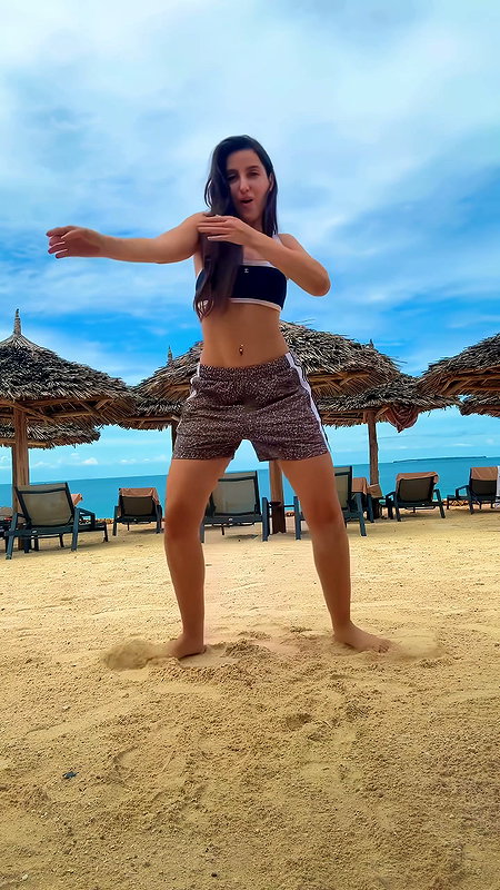 NORA FATEHI HOTTIE DESIRED TEASE ON BEACH HQ VIDEO (2)2