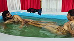 Couple Bathing in Pool