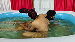 Couple Bathing in Pool