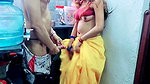 A Couple Is Having Fun in the Kitchen
