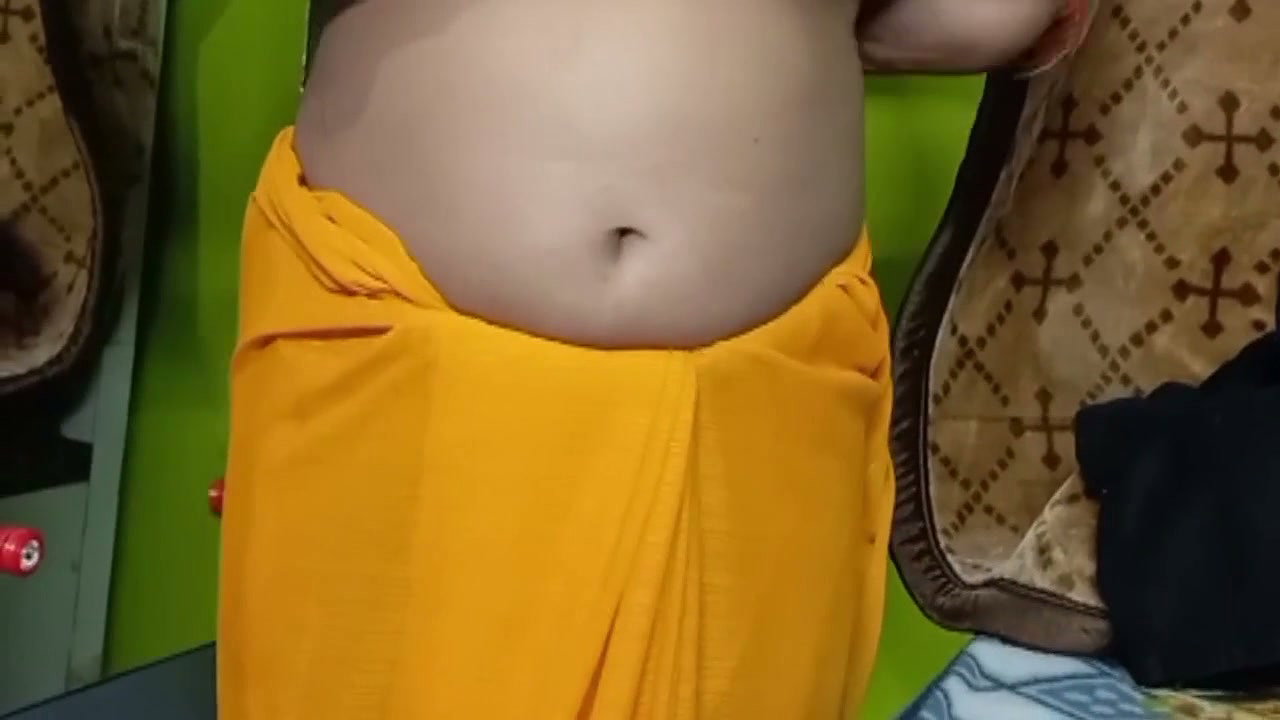 Indian Beautiful Bhabhi in Yellow Color Sari.