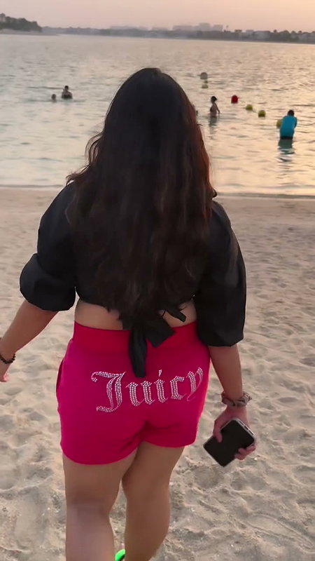 chritian sexy breasts in black beach wear2