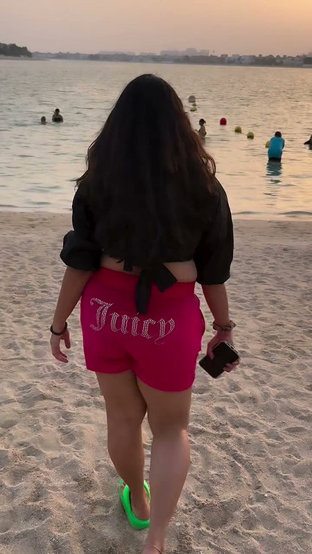 chritian sexy breasts in black beach wear2