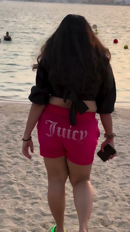 chritian sexy breasts in black beach wear2
