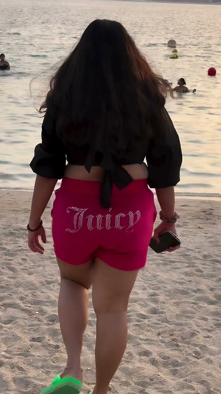 chritian sexy breasts in black beach wear2