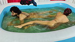 Couple Hot Romance in Pool