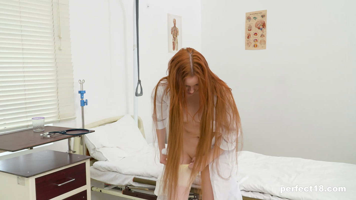 Megan Murkovski – Redhead doctor Megan Murkovski heals herself