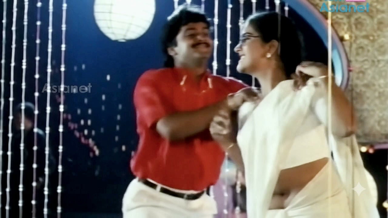 Urvashi Open Big Deep Navel show in White Saree 2