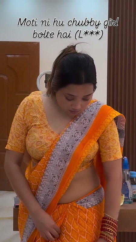 lady big deep navel in orange saree 22