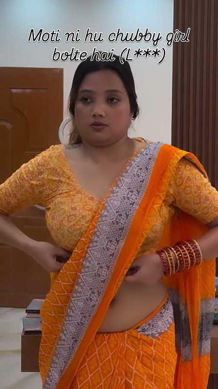 lady big deep navel in orange saree 22