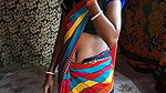 Auntie, clad in a red saree, approaches creating a beautiful and romantic moment filled with love anal sex