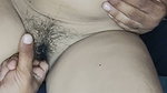 Fingers inserted into pink tight