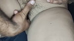 Fingers inserted into pink tight