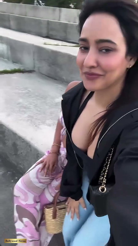 SISTERS NEHA AND AISHA SHARMA FLAUNTING MOUTHWATERING CLEAVAGE AND CURVES