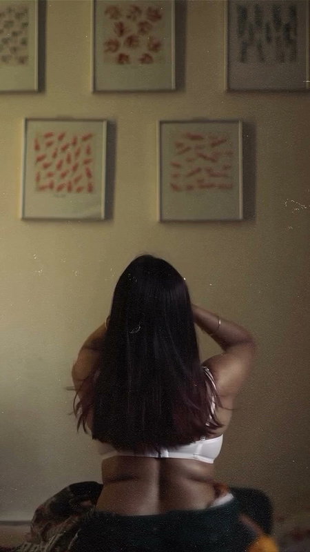 dusk lady removing cloths and showing bare back 2 2