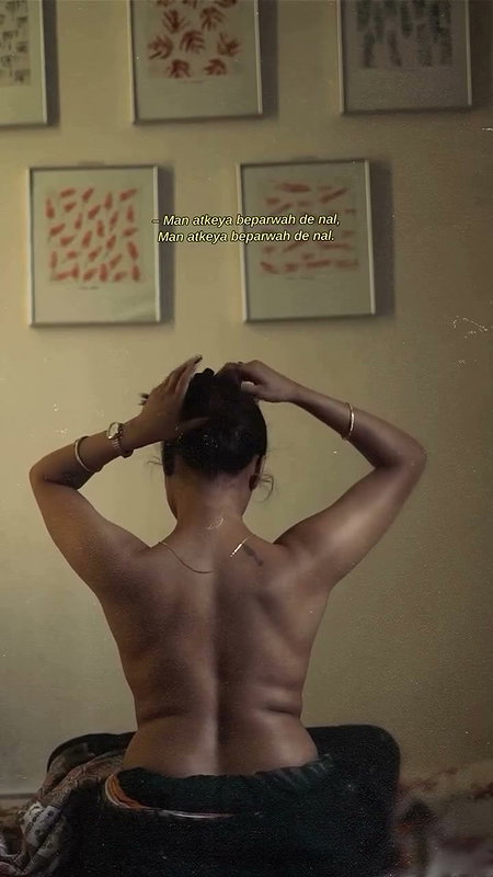 dusk lady removing cloths and showing bare back 2 2