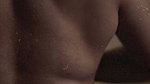 dusk lady removing cloths and showing bare back 2 2