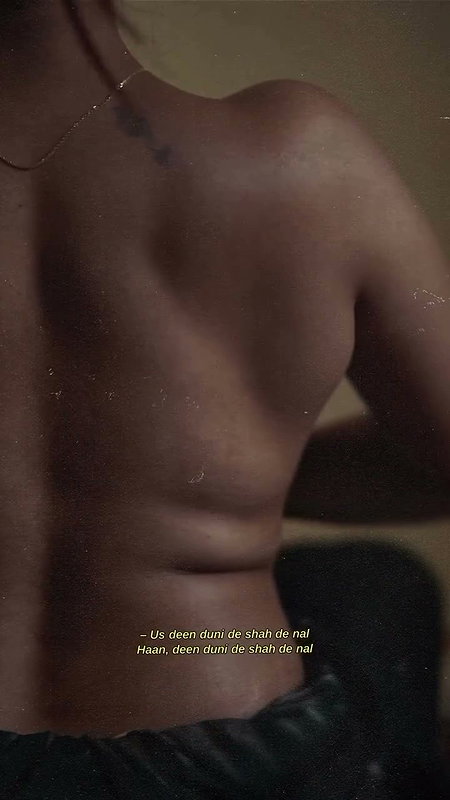 dusk lady removing cloths and showing bare back 2 2