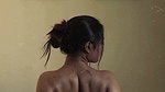 dusk lady removing cloths and showing bare back 2 2