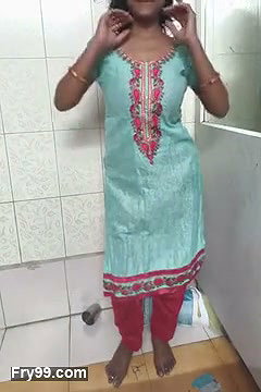 Indian Housewife in bathroom