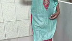 Indian Housewife in bathroom