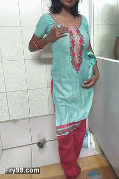 Indian Housewife in bathroom