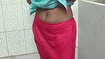 Indian Housewife in bathroom