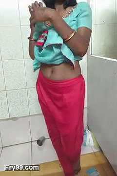 Indian Housewife in bathroom