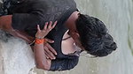 girl in wet blouse and skirt enjoyed in river