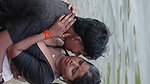 girl in wet blouse and skirt enjoyed in river