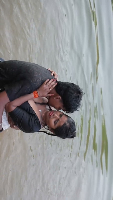 girl in wet blouse and skirt enjoyed in river