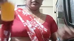aunty in sexy blouse and saree drinking juice 2