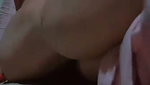 Alone in the house, a woman is calming her pussy with eggplant