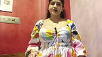 Busty Bengali lady cleavage in white dress