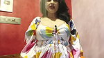Busty Bengali lady cleavage in white dress