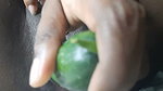 Petty girl playing with Gherkin