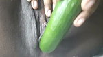 Petty girl playing with Gherkin