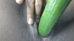 Petty girl playing with Gherkin